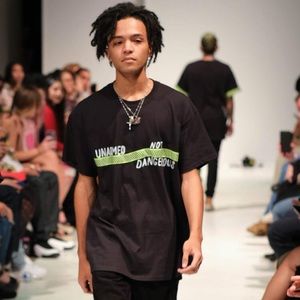 UNARMED NOT DANGEROUS ANXY runway shirt